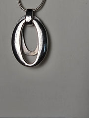 Anne Klein Silver-Tone Sculptural Double Oval Pendant Necklace - adjustable