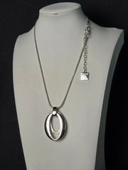 Anne Klein Silver-Tone Sculptural Double Oval Pendant Necklace - adjustable