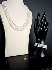LAYERED PEARL NECKLACE AND BRACELET SET