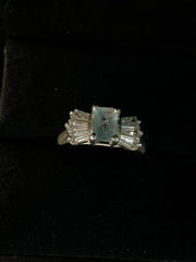 Pale Blue Emerald-Cut Three-Stone Ring