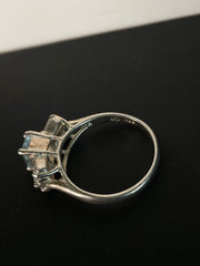 Pale Blue Emerald-Cut Three-Stone Ring